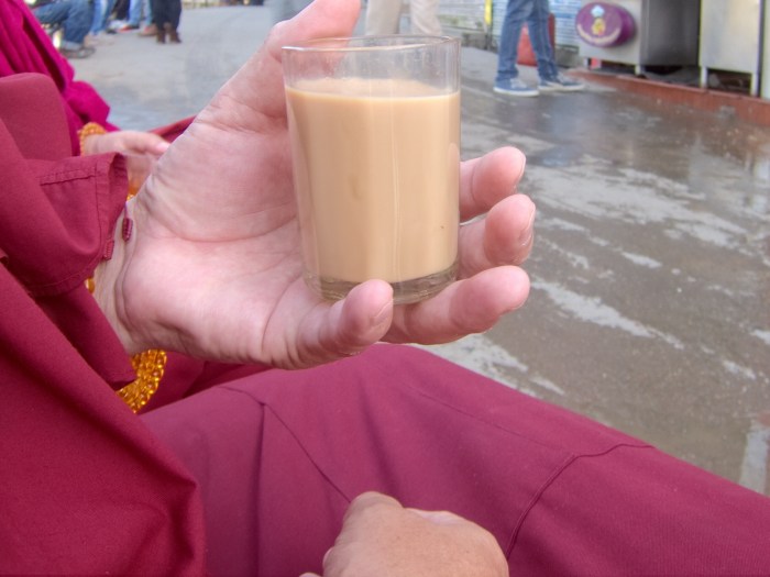 Tibetan monk having tea in McLeodganj.