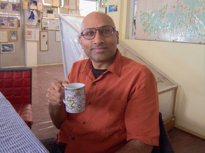 Having a cup of tea while waiting for Mr. Banerjee to join us.